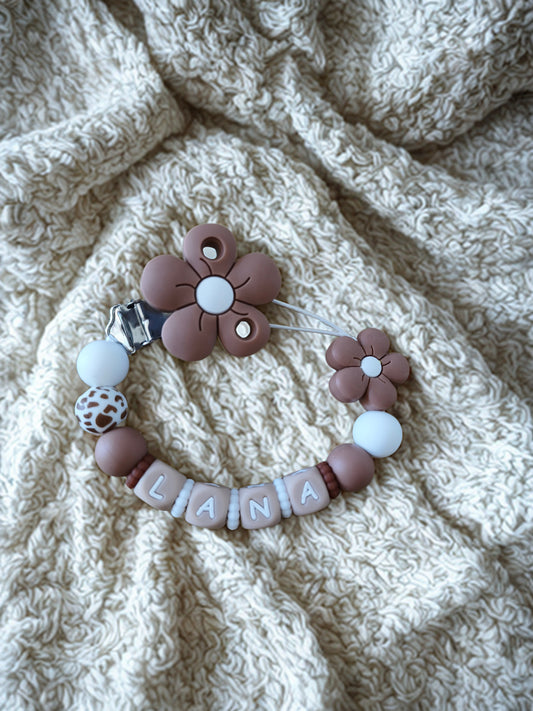 Attache tétine fleur